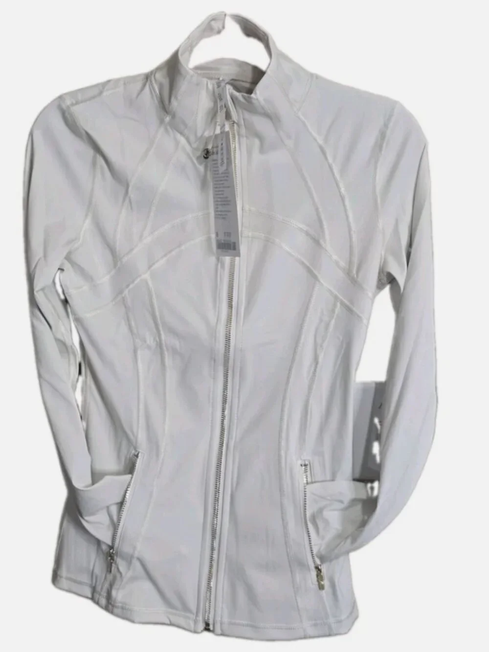 Lululemon set in the color White/Gold Jacket White Flare size 6 Align 32
